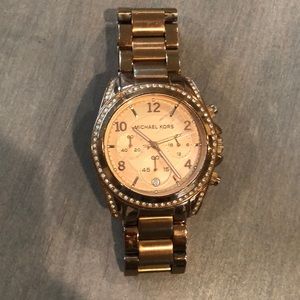 Michael Kors women’s rose gold watch, used and needs new battery.